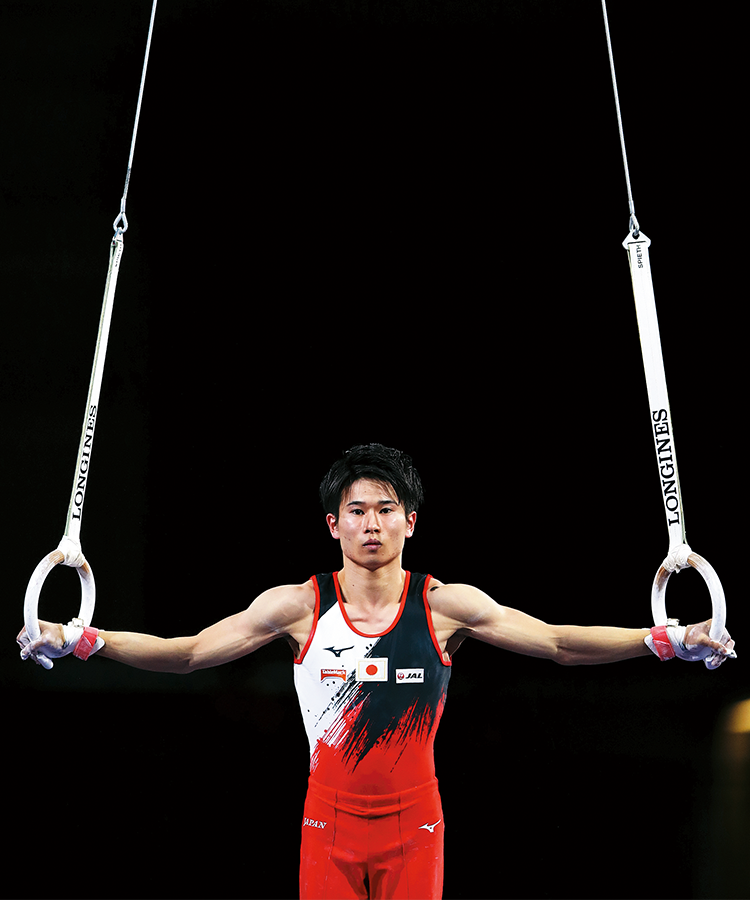 萱和磨選手のつり輪競技写真