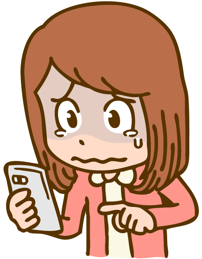 泣きながら電話する女性