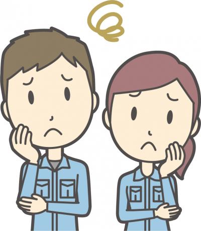 困った作業着姿の男女