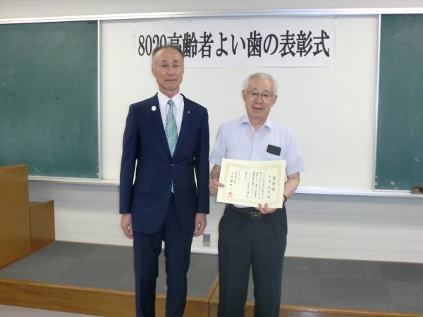 古賀　啓資　氏